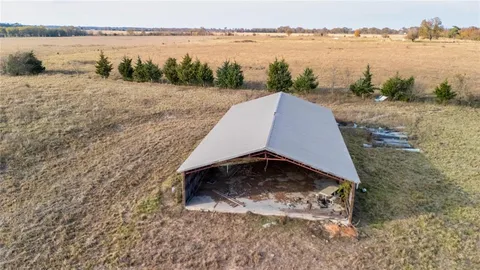 a view of a lake with houses in the back