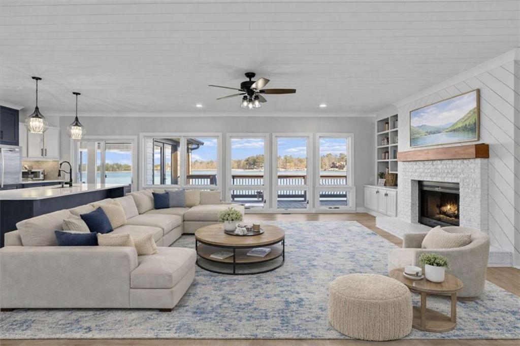 1127 Lakeshore Court Villa Rica, GA 30180 - Photo 11 of 86 a living room with furniture and a fireplace