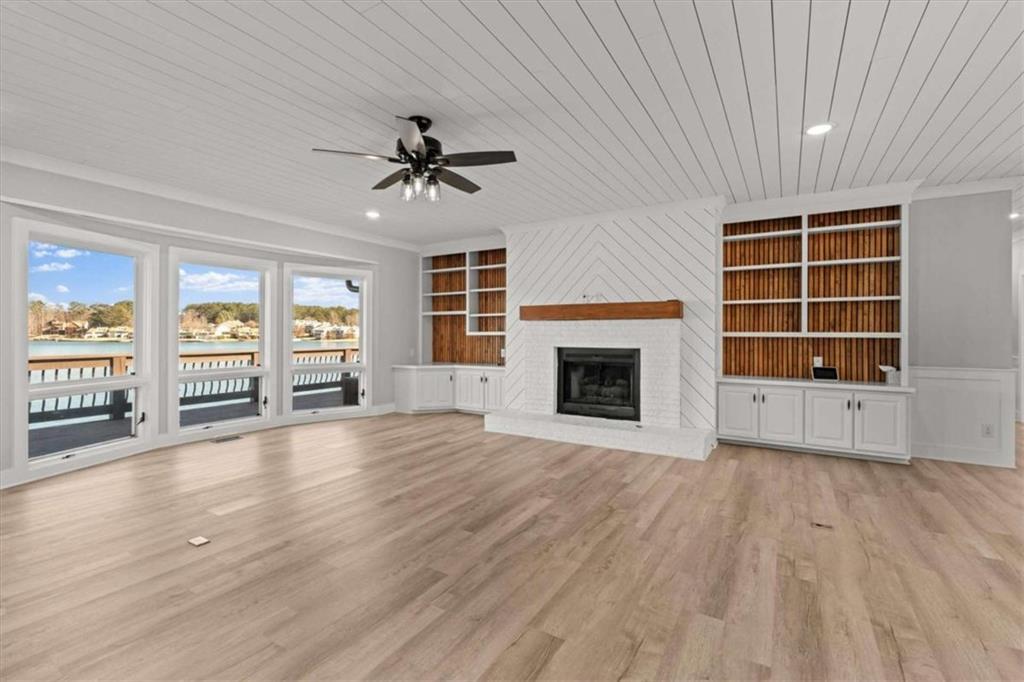 1127 Lakeshore Court Villa Rica, GA 30180 - Photo 12 of 86 a view of an empty room with a window and fireplace