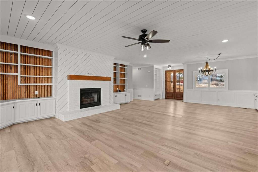 1127 Lakeshore Court Villa Rica, GA 30180 - Photo 14 of 86 a view of an empty room with a window and fireplace