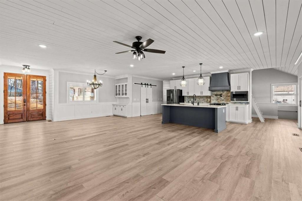 1127 Lakeshore Court Villa Rica, GA 30180 - Photo 16 of 86 a view of a kitchen with a sink and a stove top oven