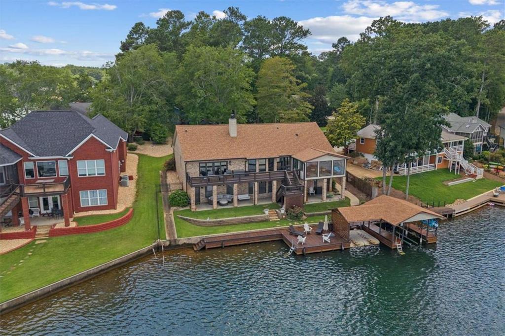 1127 Lakeshore Court Villa Rica, GA 30180 - Photo 2 of 86 an aerial view of a house with a garden and plants