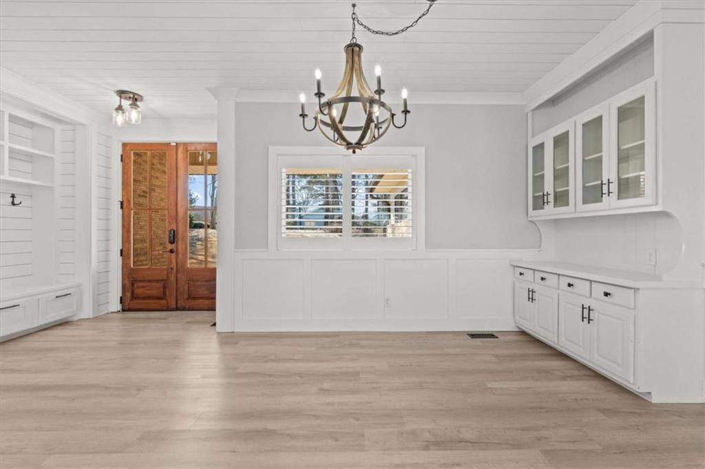 1127 Lakeshore Court Villa Rica, GA 30180 - Photo 24 of 86 a view of empty room with wooden floor and fan