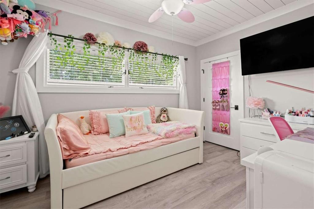 1127 Lakeshore Court Villa Rica, GA 30180 - Photo 29 of 86 a living room with furniture and a flat screen tv