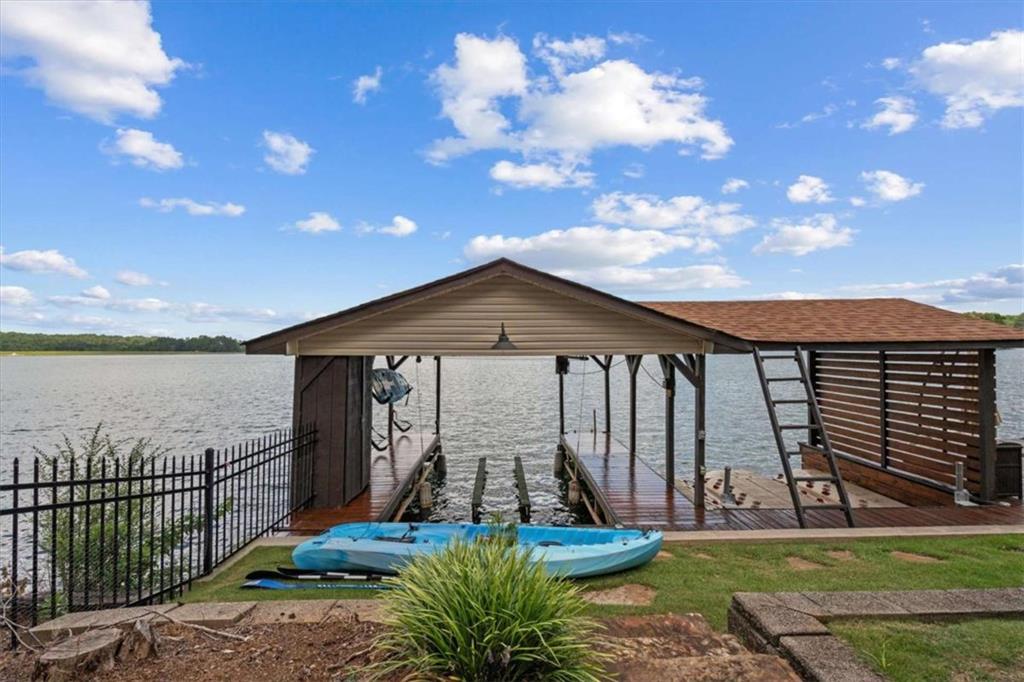 1127 Lakeshore Court Villa Rica, GA 30180 - Photo 57 of 86 a front view of house with yard and entertaining space