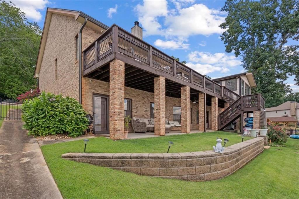 1127 Lakeshore Court Villa Rica, GA 30180 - Photo 59 of 86 front view of a house with a big yard
