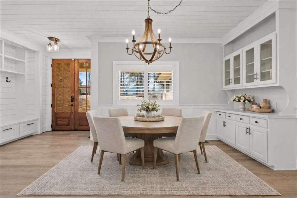 1127 Lakeshore Court Villa Rica, GA 30180 - Photo 6 of 86 a view of a dining room with furniture window and wooden floor
