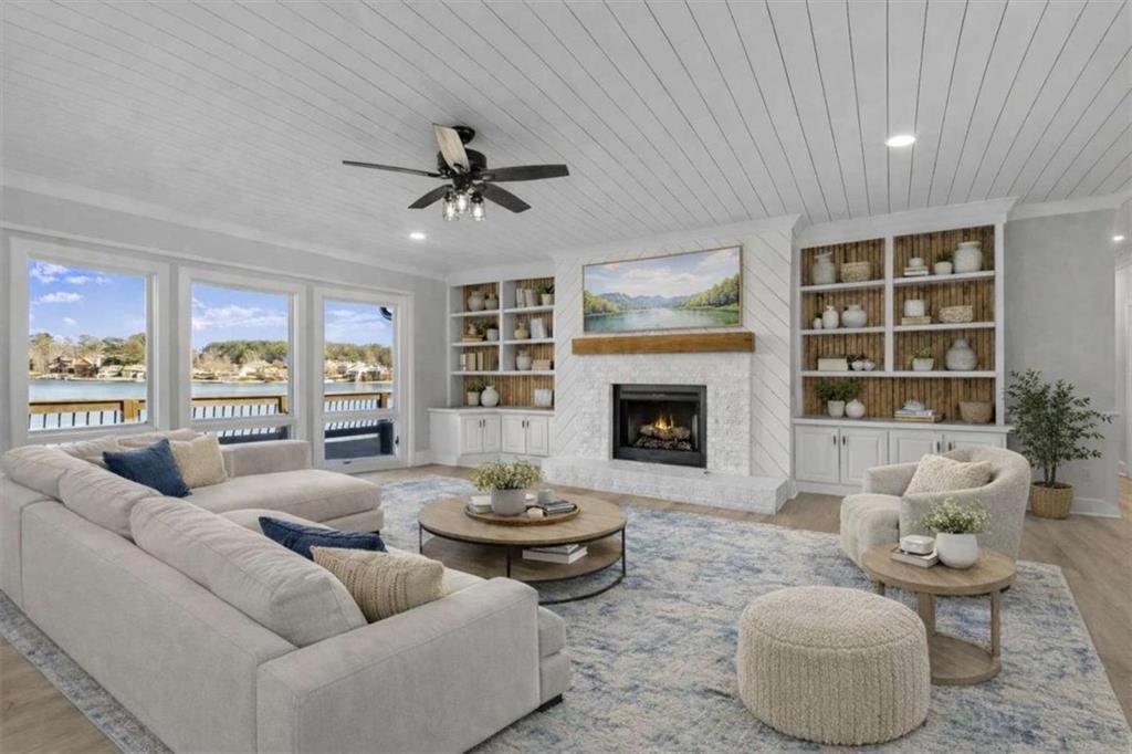 1127 Lakeshore Court Villa Rica, GA 30180 - Photo 7 of 86 a living room with furniture and a fireplace