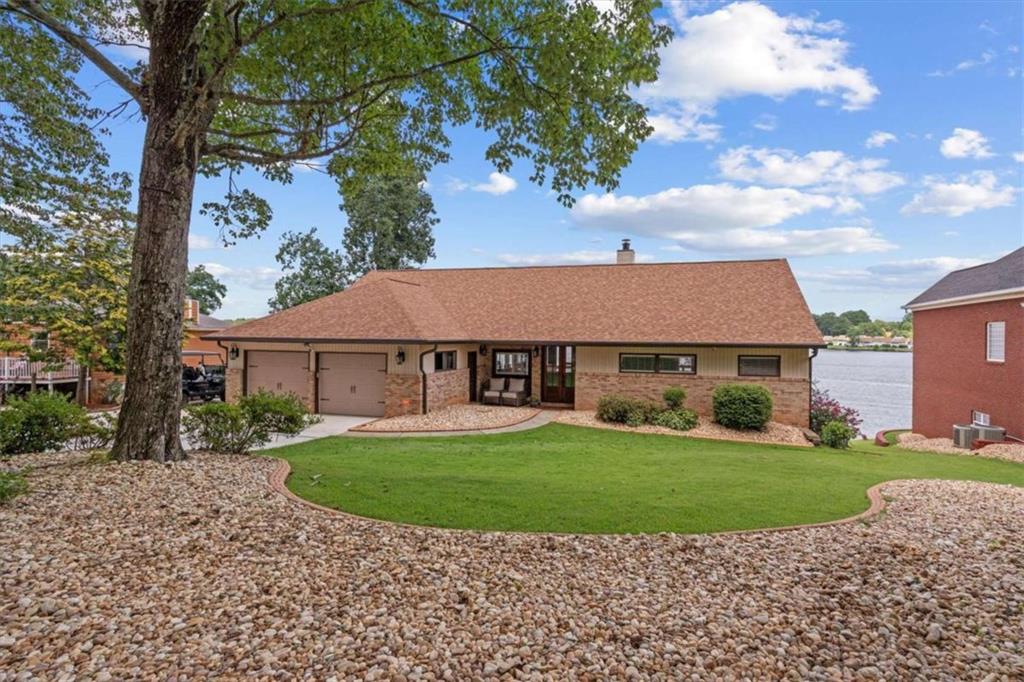 1127 Lakeshore Court Villa Rica, GA 30180 - Photo 83 of 86 a view of a house with a garden