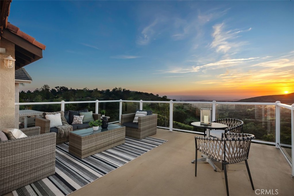 18831 Vista Portola Road Lake Forest, CA 92679 - Photo 1 of 1 a view of a roof deck with furniture