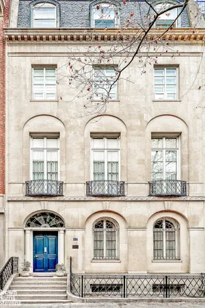a front view of a building with windows