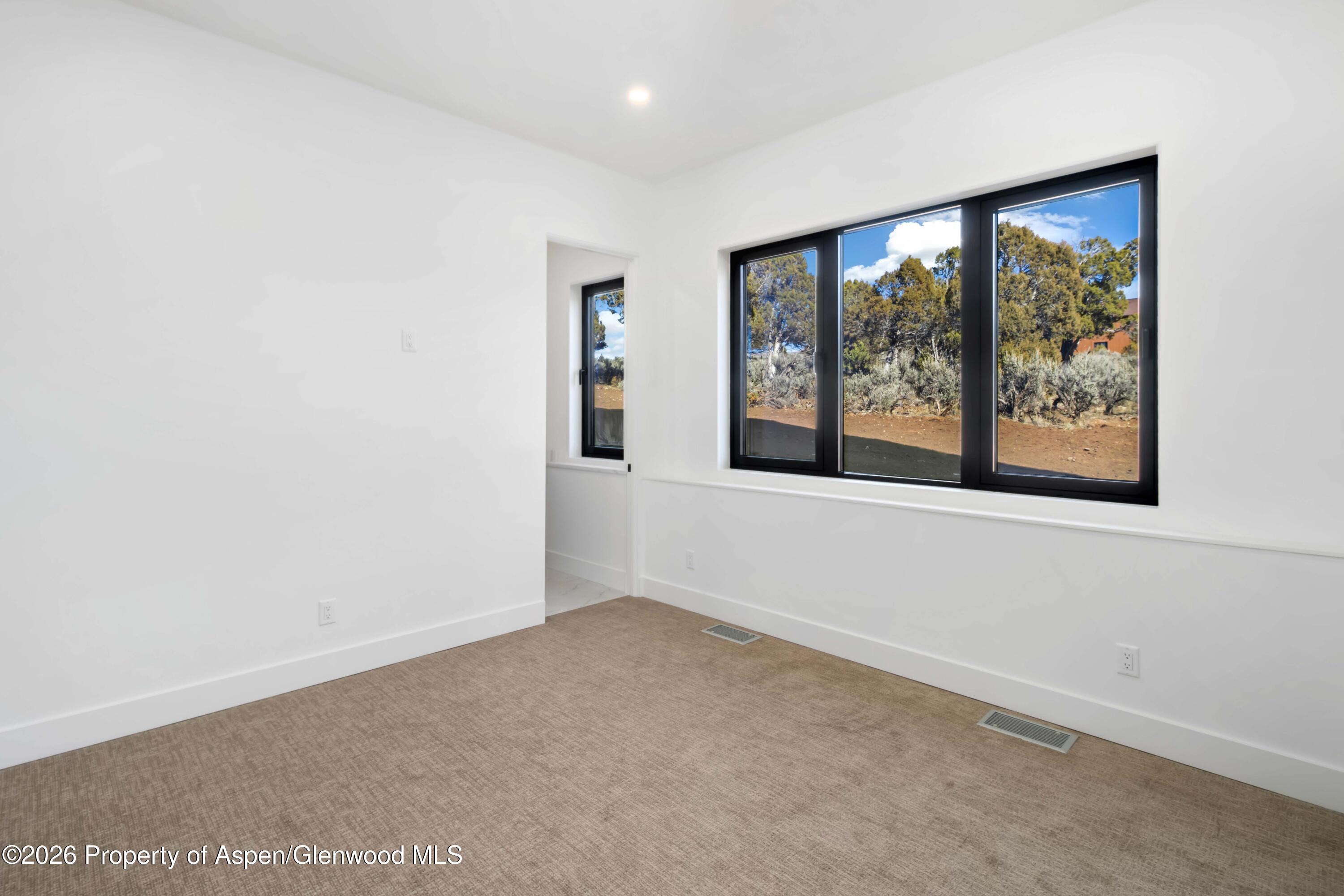 38 Woodruff Road Glenwood Springs, CO 81601 - Photo 24 of 34 an empty room with windows