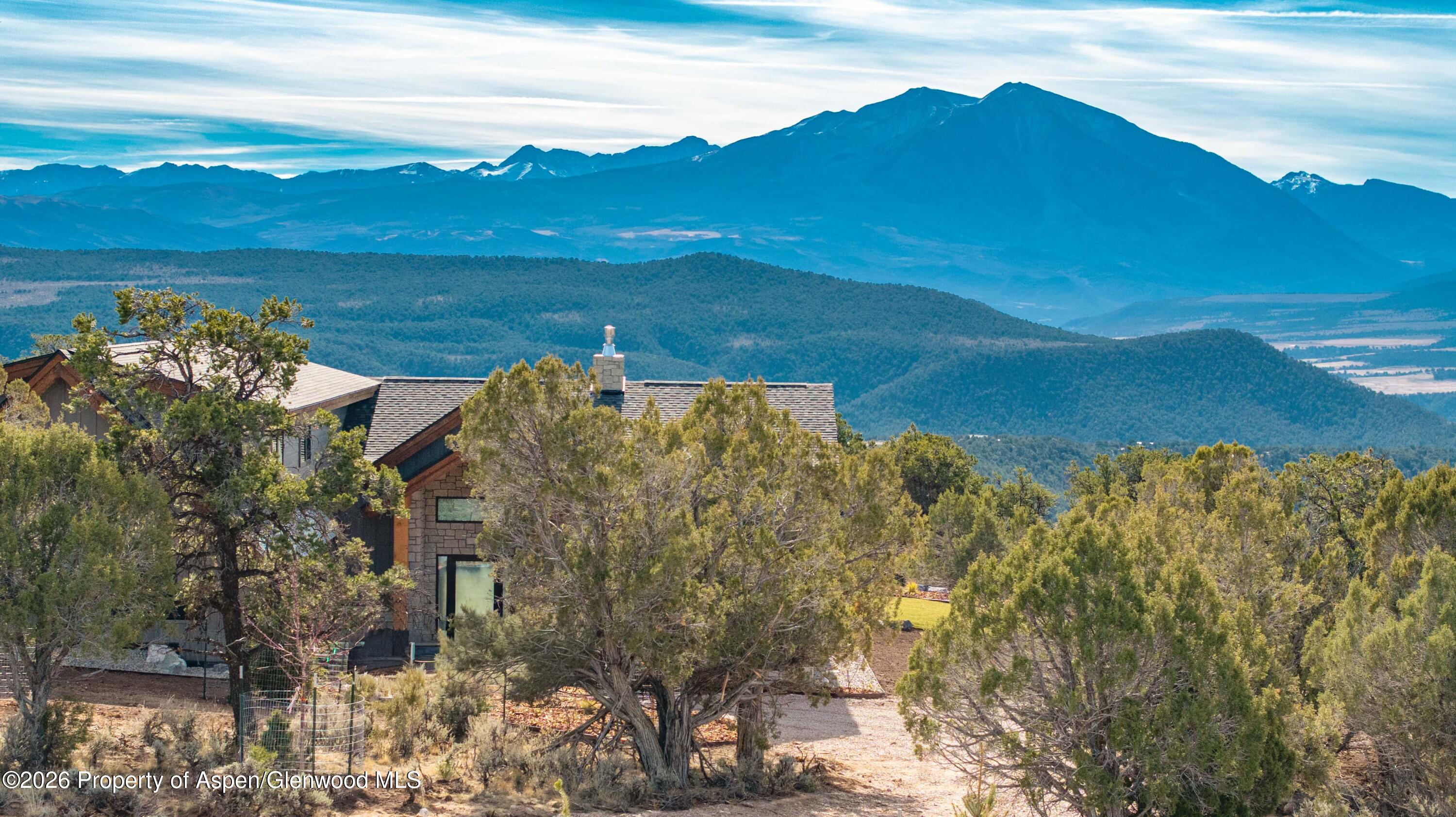 38 Woodruff Road Glenwood Springs, CO 81601 - Photo 33 of 34 a view of a lake with a mountain in the background