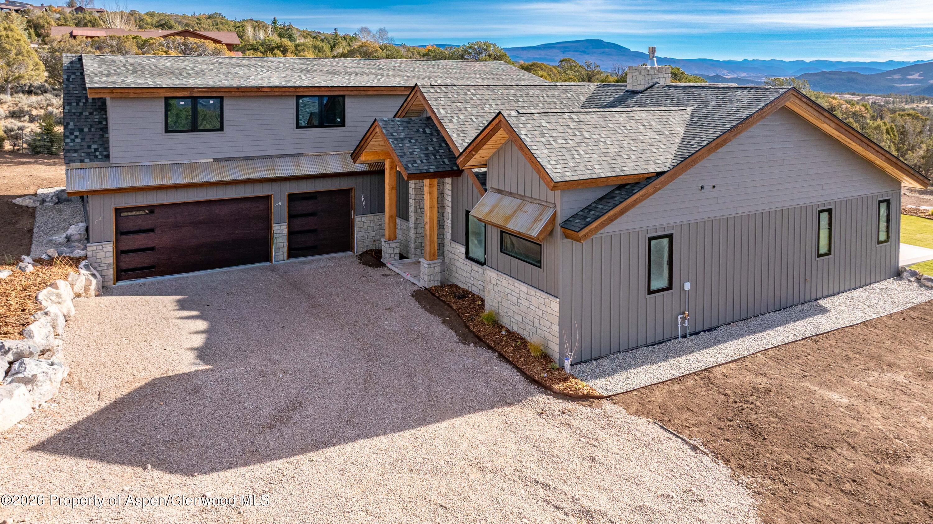 38 Woodruff Road Glenwood Springs, CO 81601 - Photo 4 of 34 an aerial view of a house with a yard