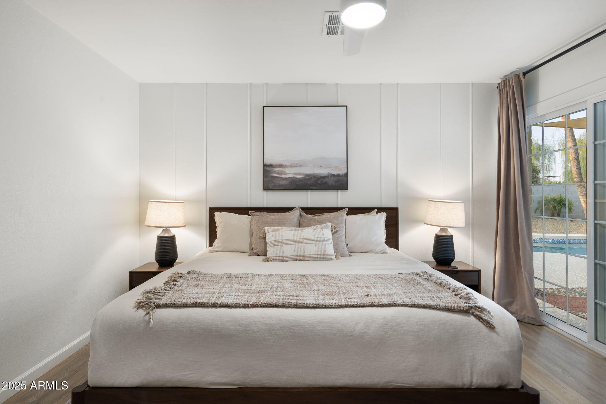 5142 East Nisbet Road Scottsdale, AZ 85254 - Photo 24 of 54 a bedroom with a bed and a large window