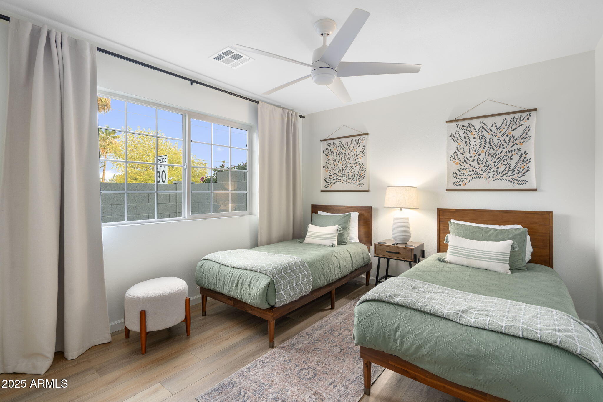 5142 East Nisbet Road Scottsdale, AZ 85254 - Photo 29 of 54 a bedroom with two beds and painting on the wall