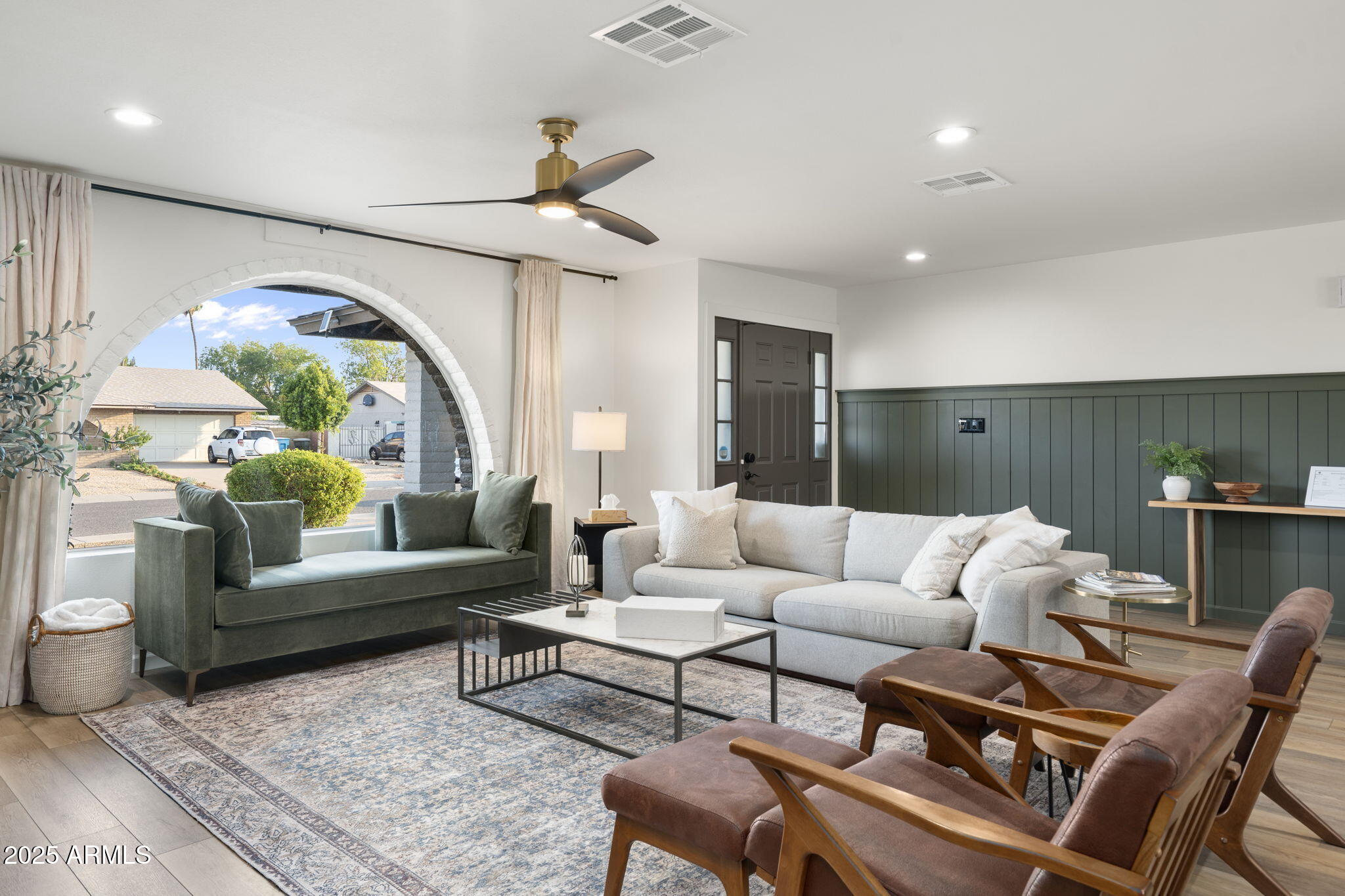 5142 East Nisbet Road Scottsdale, AZ 85254 - Photo 3 of 54 a living room with furniture and a large window