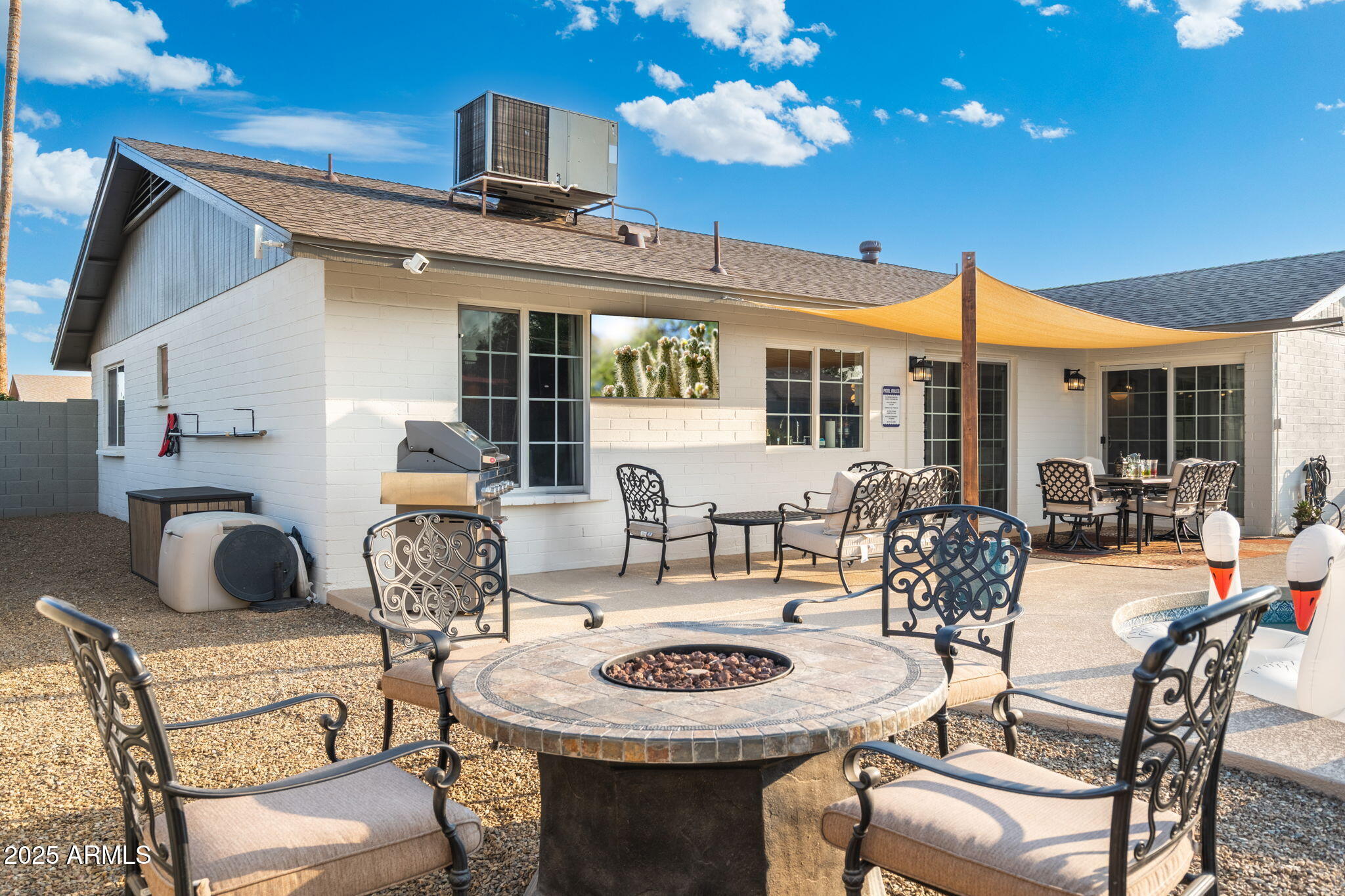 5142 East Nisbet Road Scottsdale, AZ 85254 - Photo 45 of 54 a view of a dining room with furniture