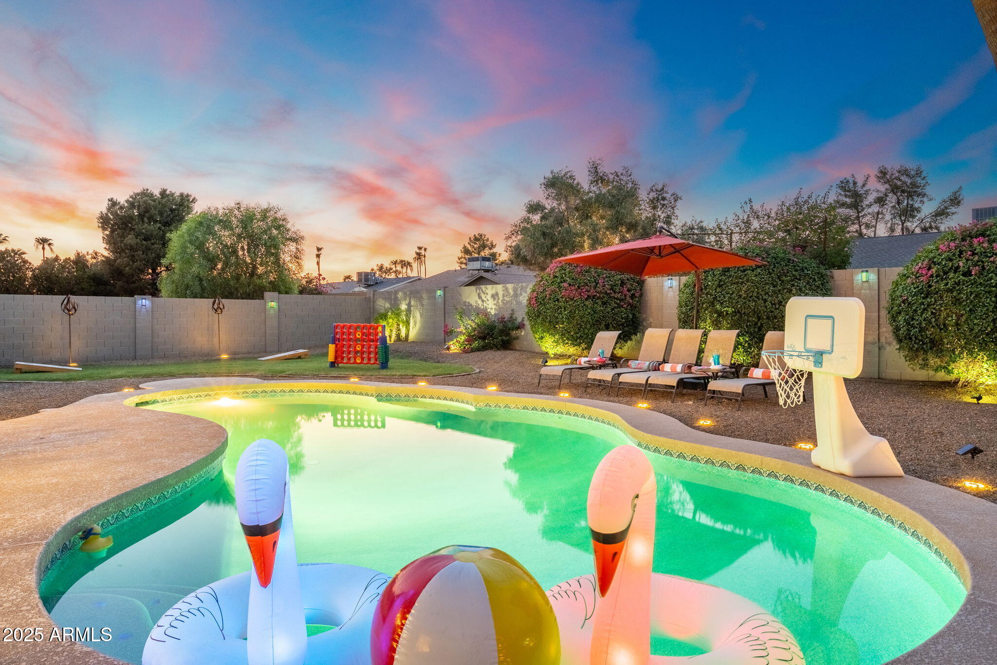 5142 East Nisbet Road Scottsdale, AZ 85254 - Photo 48 of 54 a view of a swimming pool with a patio