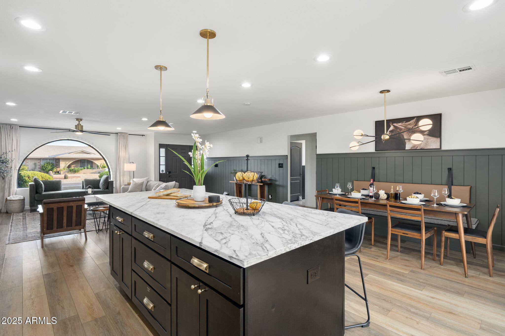 5142 East Nisbet Road Scottsdale, AZ 85254 - Photo 9 of 54 a kitchen with a table and chairs in it