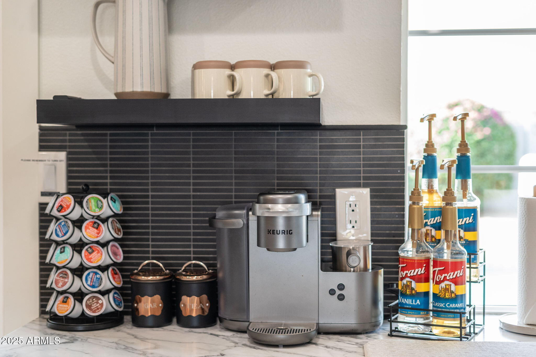 5142 East Nisbet Road Scottsdale, AZ 85254 - Photo 10 of 54 a front view of a house with outdoor seating