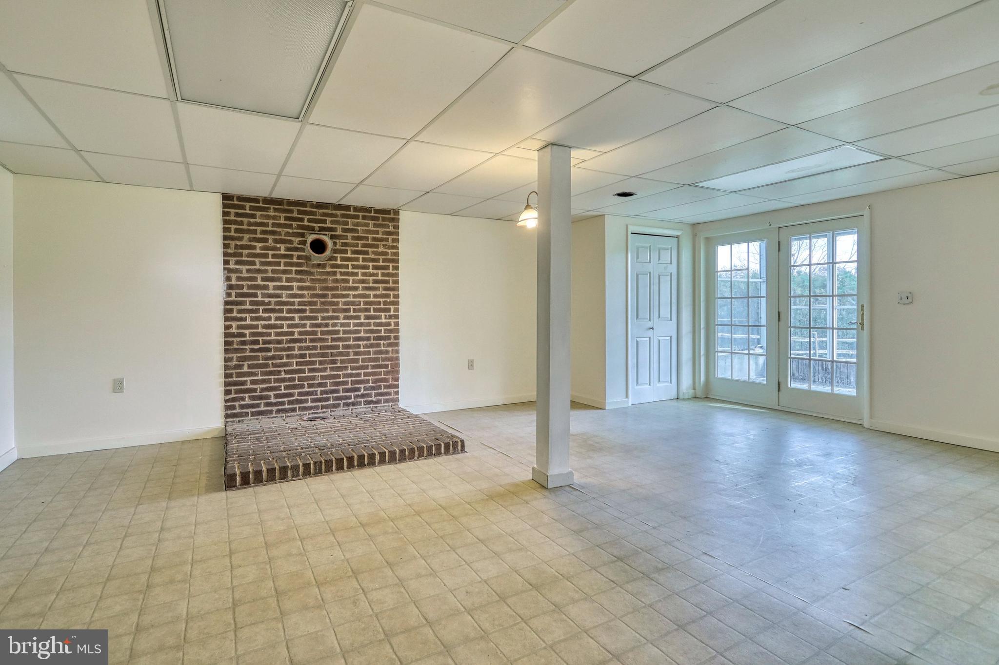 71 Michelle Way Hanover, PA 17331 - Photo 34 of 48 finished lower level with brick hearth