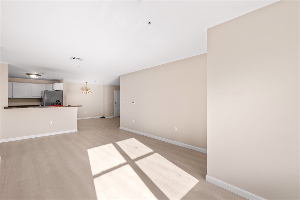 30 Franklin Street, Unit 314 Malden, MA 02148 - Photo 12 of 28 a view of a kitchen with a sink and a window
