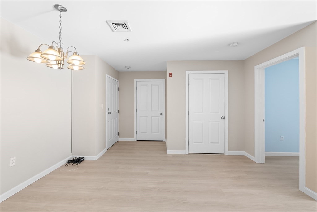 30 Franklin Street, Unit 314 Malden, MA 02148 - Photo 14 of 28 a view of a chandelier in a room