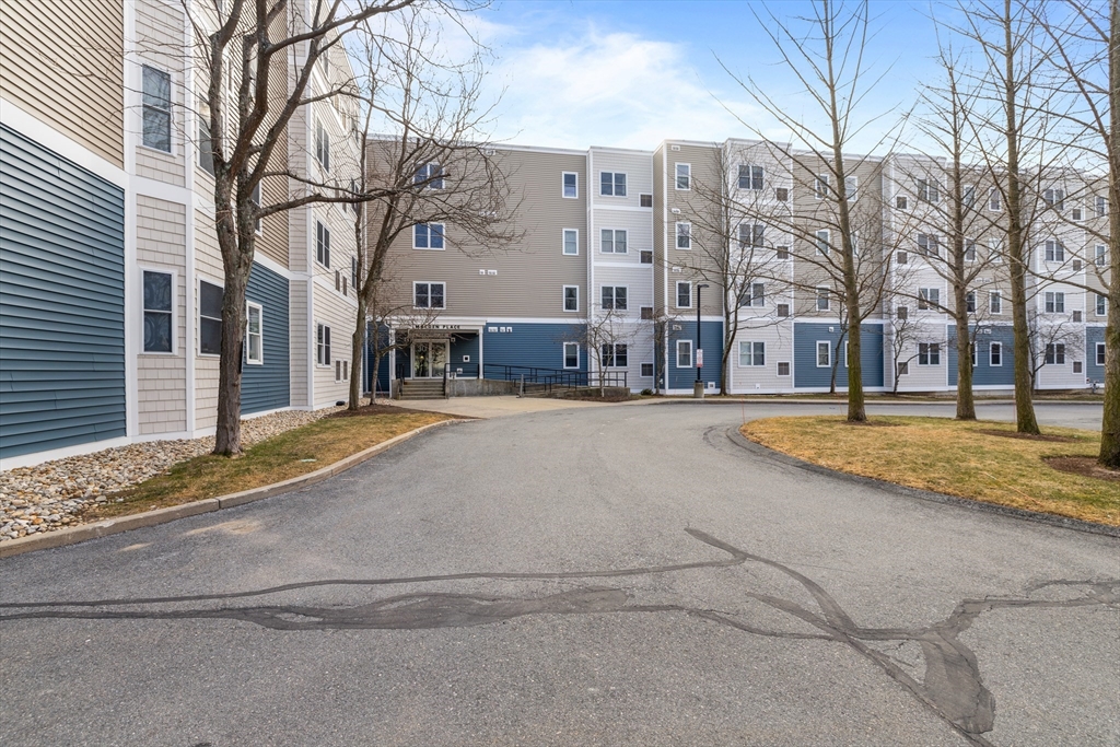 30 Franklin Street, Unit 314 Malden, MA 02148 - Photo 2 of 28 a view of city with tall buildings