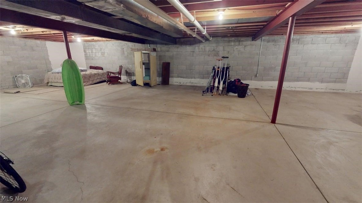 3985 Wiers Road Willard, OH 44890 - Photo 48 of 50 Expansive unfinished basement 25x47 storage area