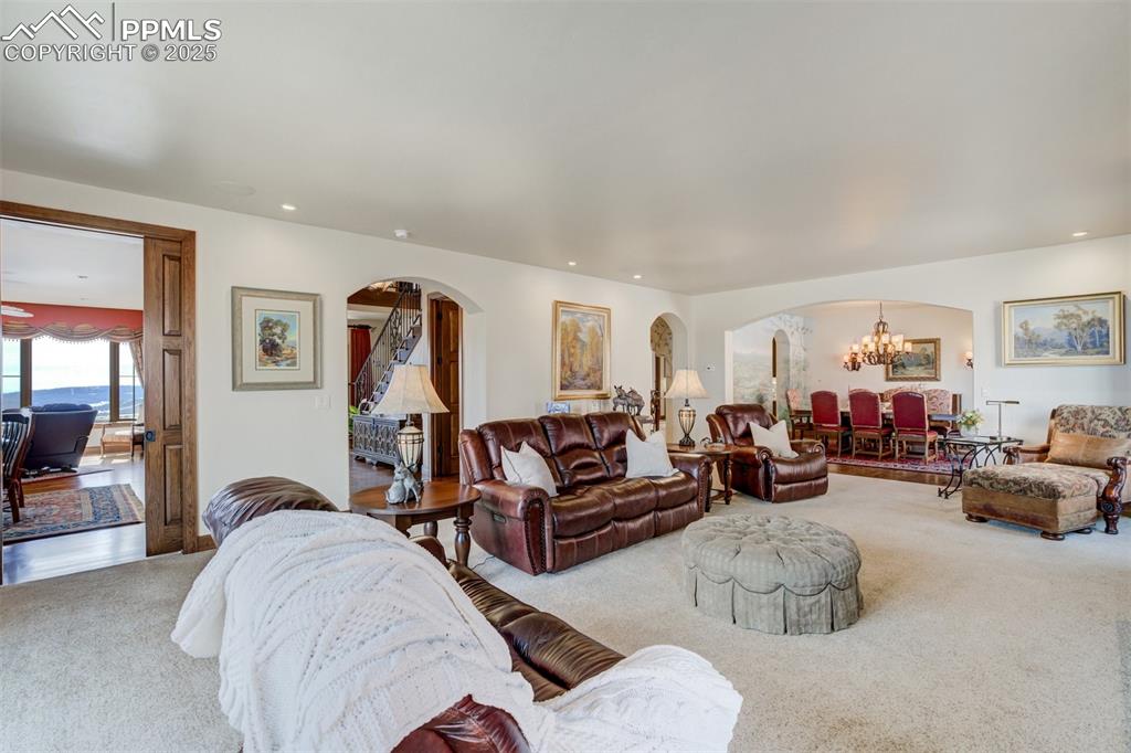 14250 Aiken Ride View Colorado Springs, CO 80926 - Photo 12 of 50 a living room with furniture and a gym
