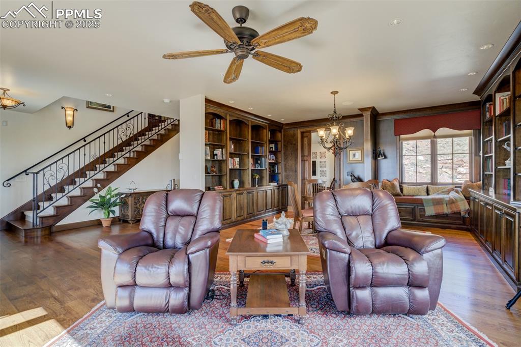 14250 Aiken Ride View Colorado Springs, CO 80926 - Photo 8 of 50 a living room with furniture