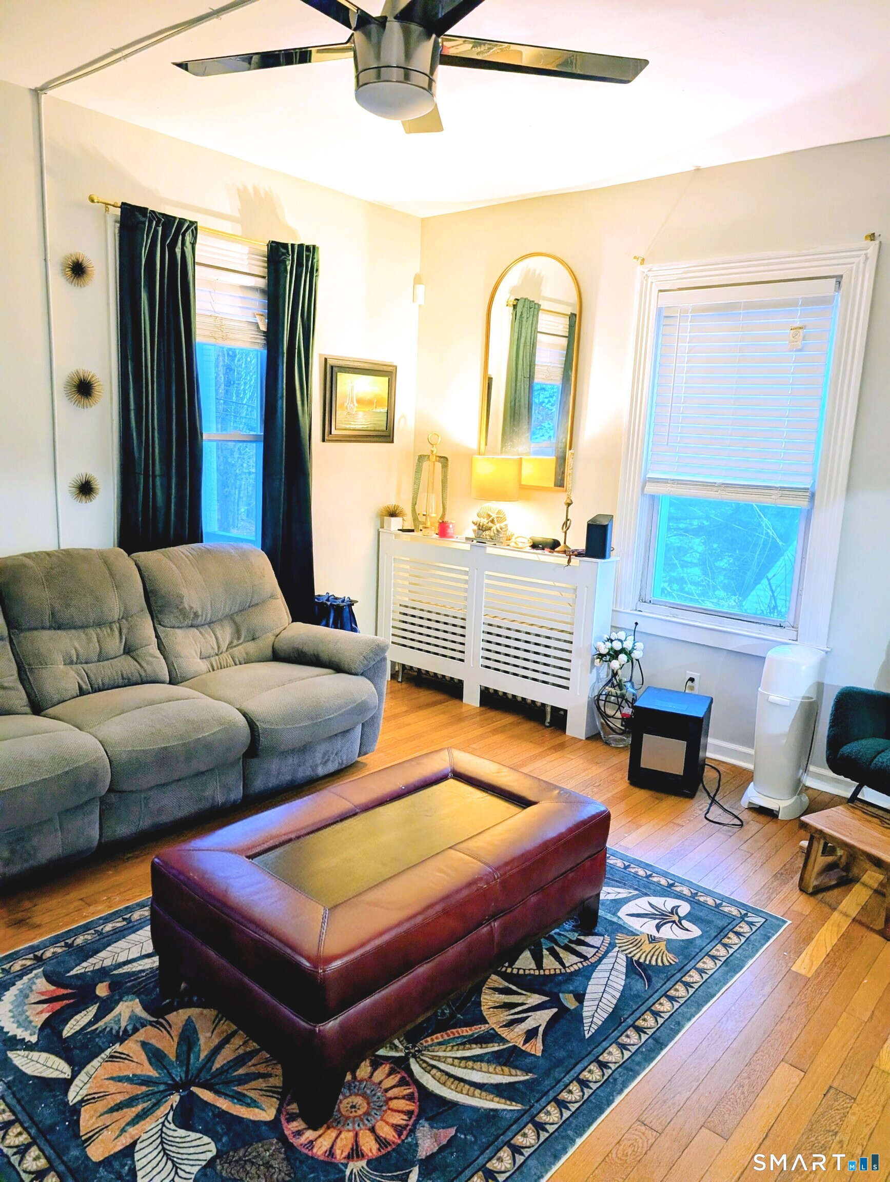 100 7th Street Norwich, CT 06360 - Photo 11 of 32 a bedroom with furniture and a wooden floor
