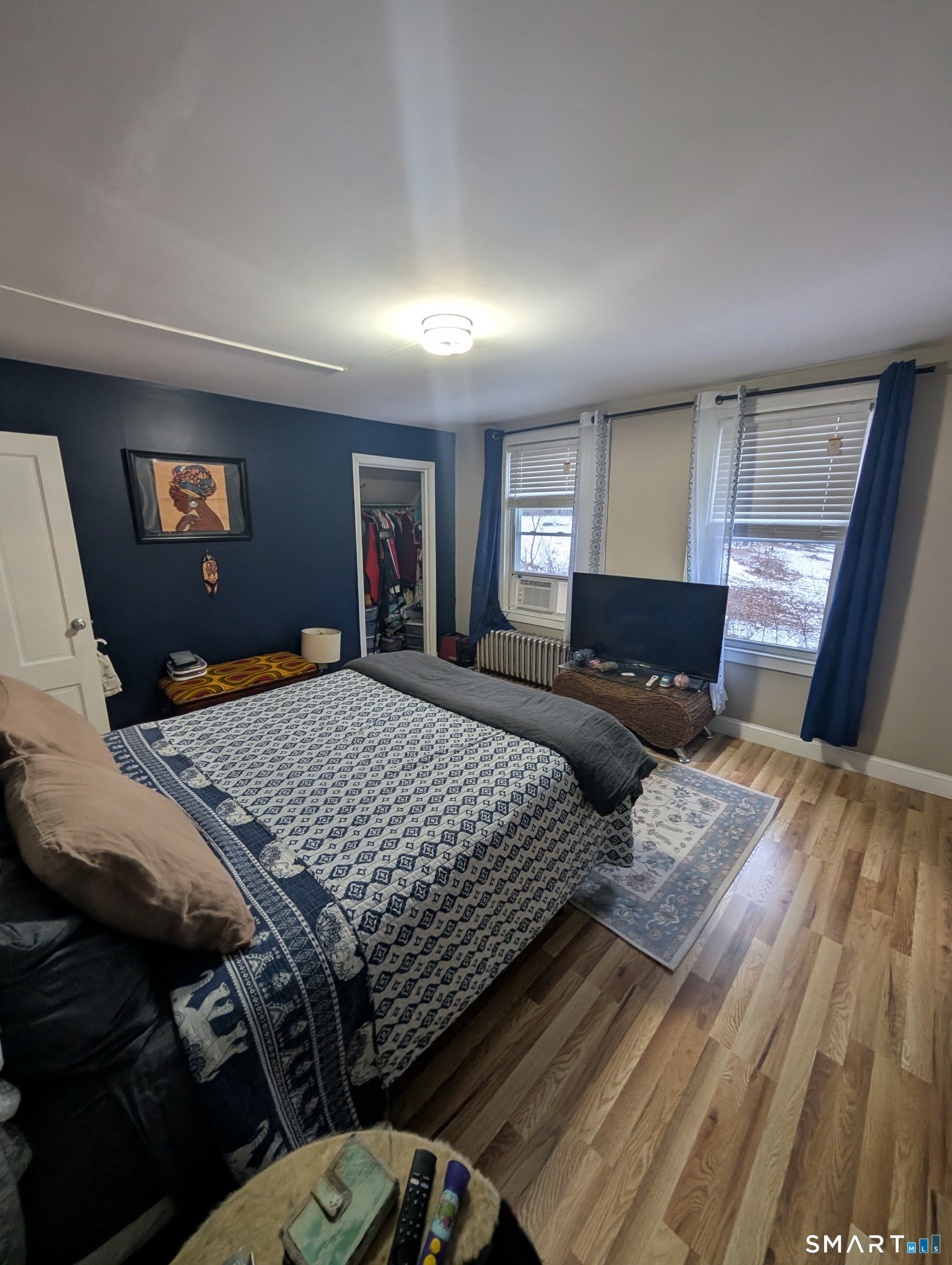 100 7th Street Norwich, CT 06360 - Photo 26 of 32 a bedroom with a bed window and couch
