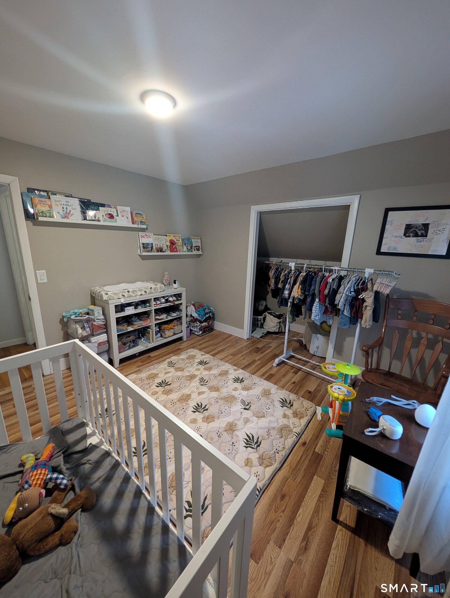 100 7th Street Norwich, CT 06360 - Photo 27 of 32 a view of a livingroom with furniture hardwood floor and that has a couch