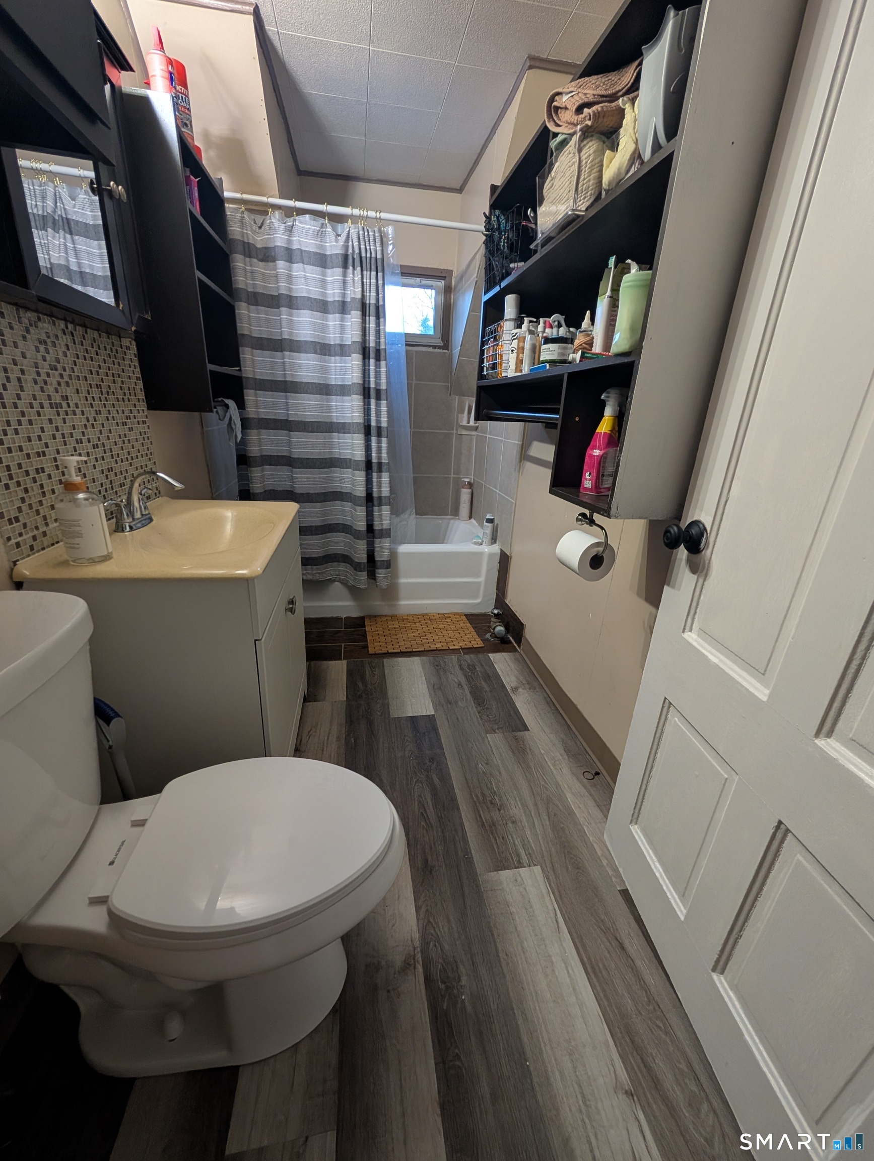 100 7th Street Norwich, CT 06360 - Photo 29 of 32 a bathroom with a toilet a sink and a bathtub