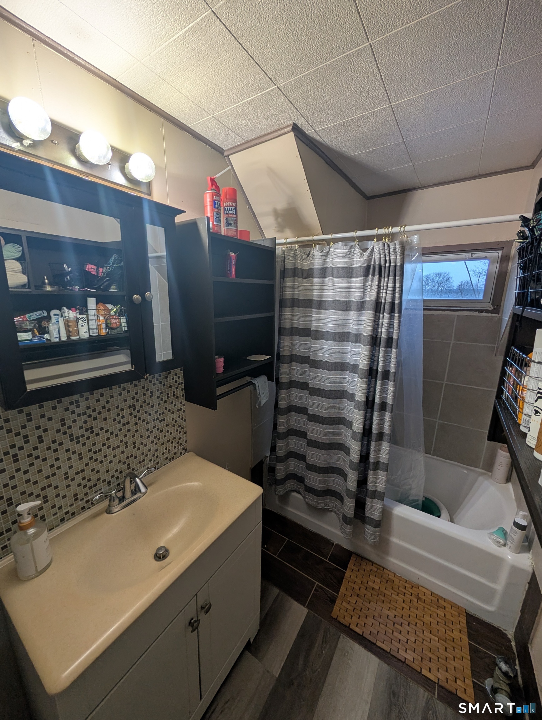 100 7th Street Norwich, CT 06360 - Photo 30 of 32 a bathroom with a sink a toilet and shower