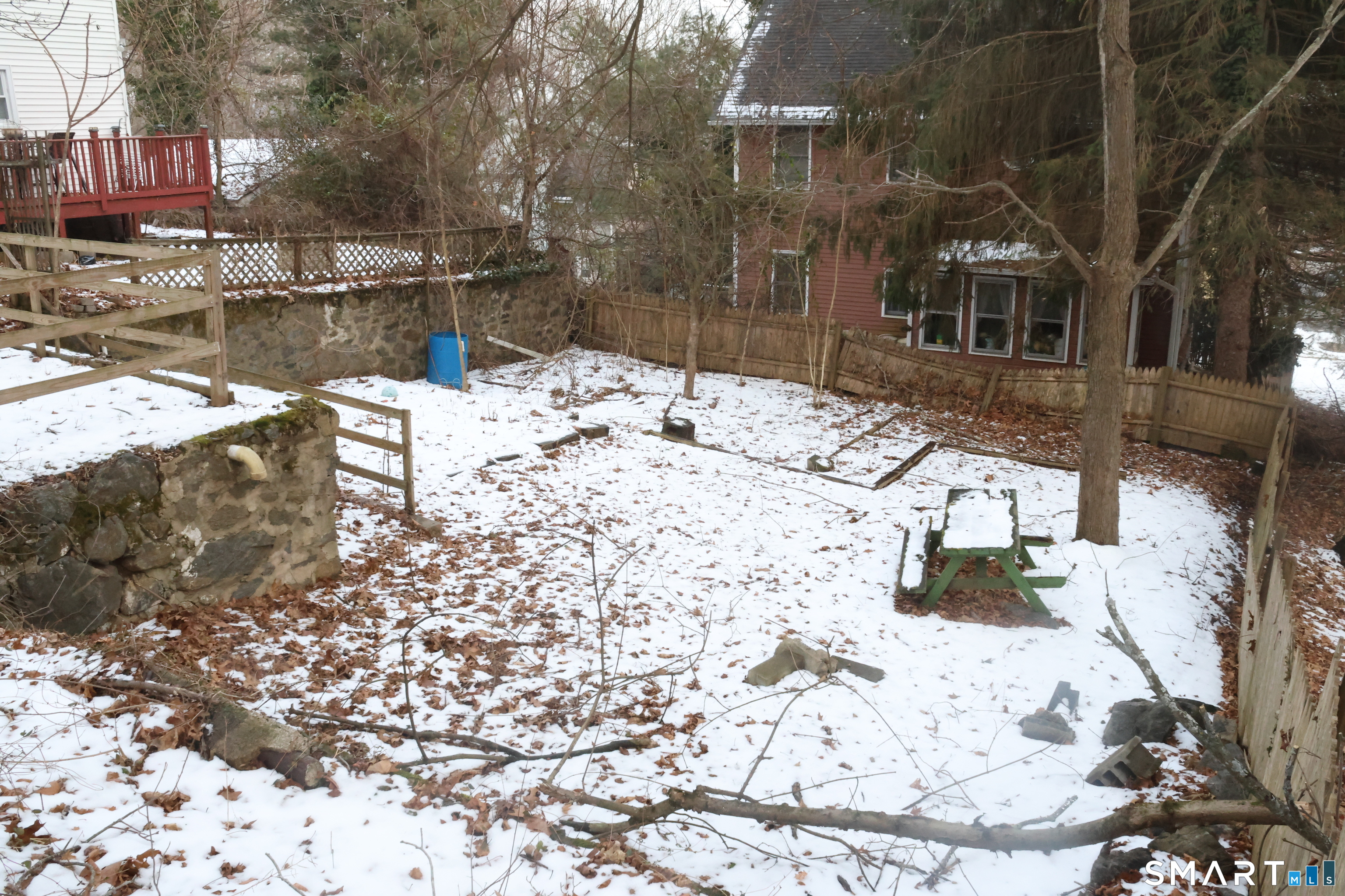 100 7th Street Norwich, CT 06360 - Photo 6 of 32 a view of a yard covered in snow