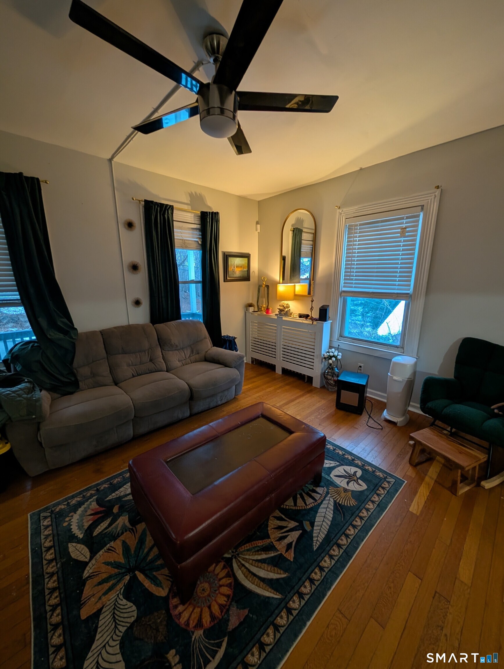 100 7th Street Norwich, CT 06360 - Photo 10 of 32 a living room with furniture and a window
