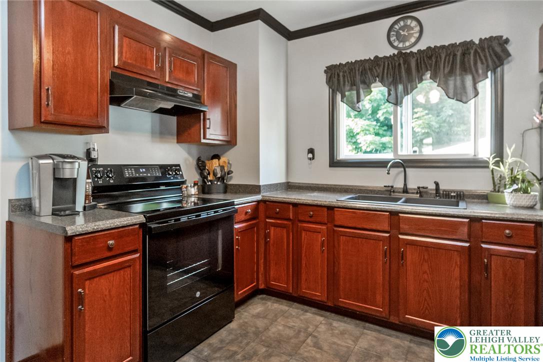 365 Rock Street Easton, PA 18042 - Photo 16 of 50 Well-appointed kitchen offering abundant cabinet storage and modern appliances.