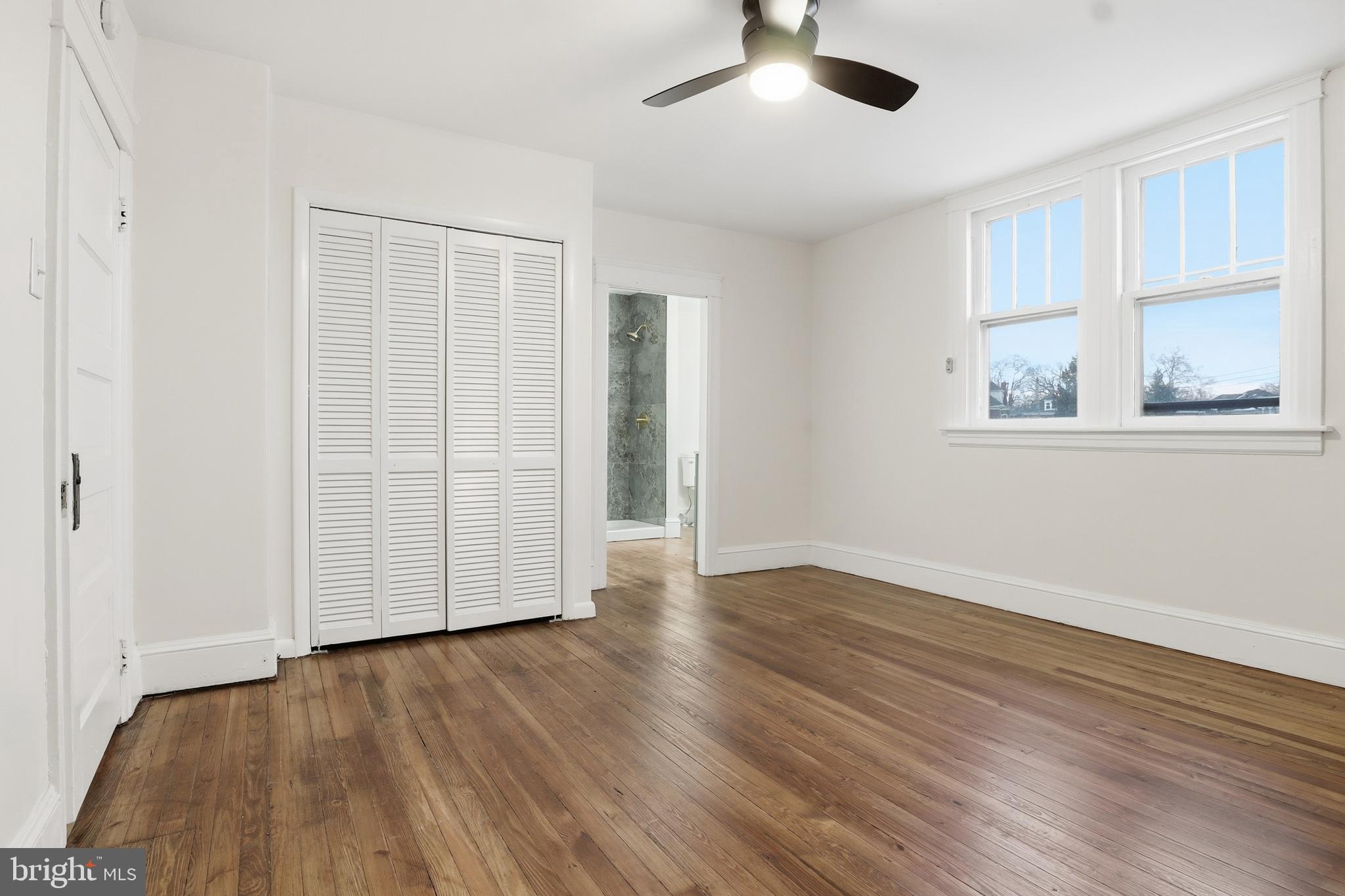 33 Sprenkle Avenue Hanover, PA 17331 - Photo 33 of 53 an empty room with wooden floor cabinet and windows