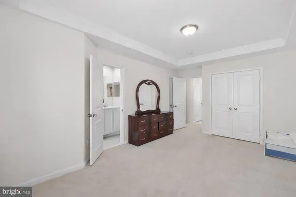 a room with painting and a gate