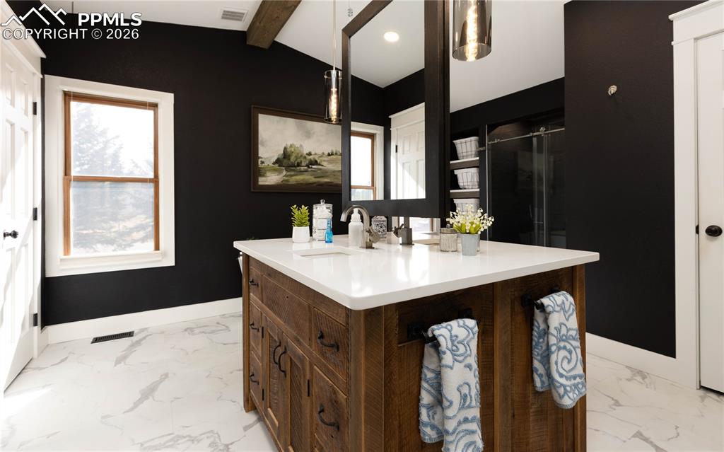 17840 New London Road Monument, CO 80132 - Photo 26 of 38 Primary bathroom with facing dual vanities