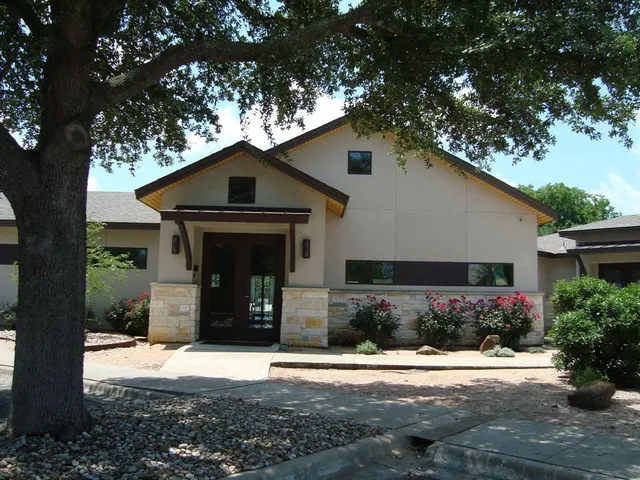 a view of a backyard with a tub