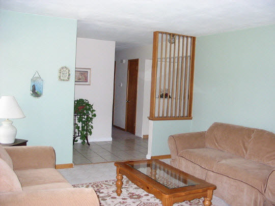 2970 Reid Farm Road Rockford, IL 61114 - Photo 2 of 6 a living room with furniture and a window