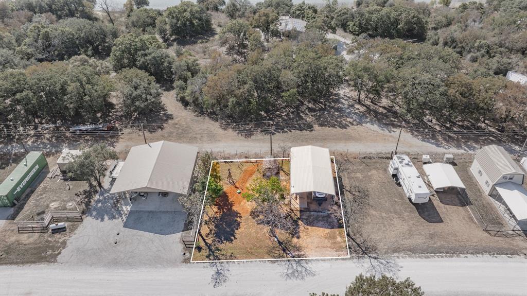 357 Discovery Bay Road Comanche, TX 76442 - Photo 19 of 32 an aerial view of a house with outdoor space