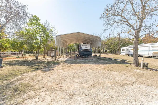 a house with trees in front of it