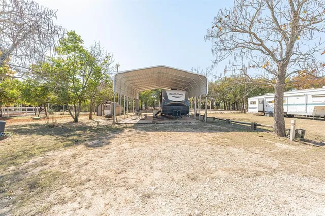 a house with trees in front of it