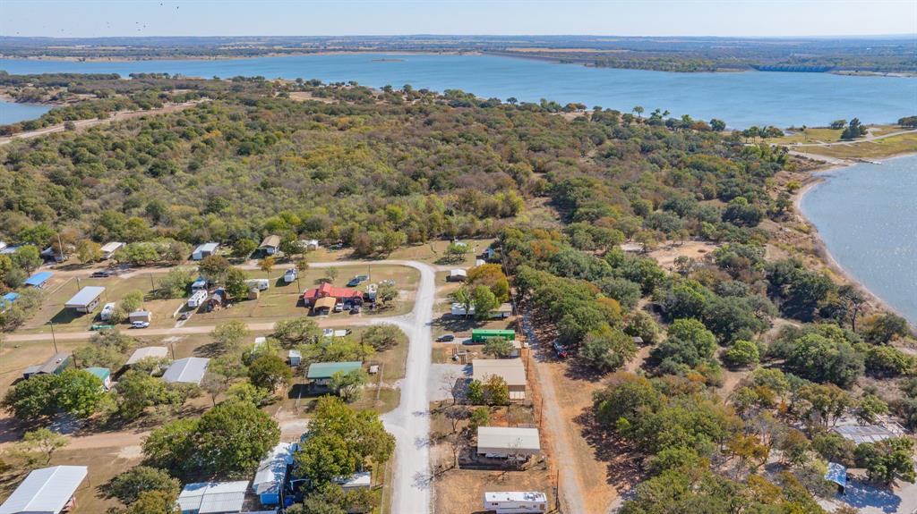 357 Discovery Bay Road Comanche, TX 76442 - Photo 23 of 32 an aerial view of multiple house