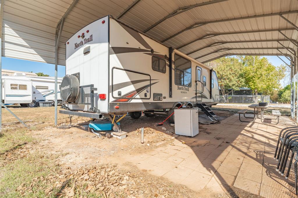357 Discovery Bay Road Comanche, TX 76442 - Photo 7 of 32 a view of a swimming pool with sitting area